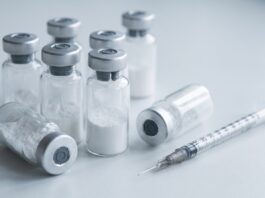 Peptides Are the Question at the Counter. Here’s How to Answer, Merchandise, and Keep the Sale Vials of white lyophilized injectable peptide powder with a syringe, representing unauthorized peptide drugs sold online in Canada