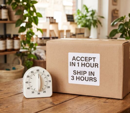 The One-Hour Accept Rule Behind IHR Plugin’s Store Network Shipping box on a health store counter labelled accept in 1 hour, ship in 3 hours, beside a kitchen timer set to 60 minutes